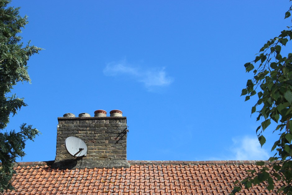 Satellite dish hidden by a chimney feature (Welwyn Hatfield Borough Council 2018)